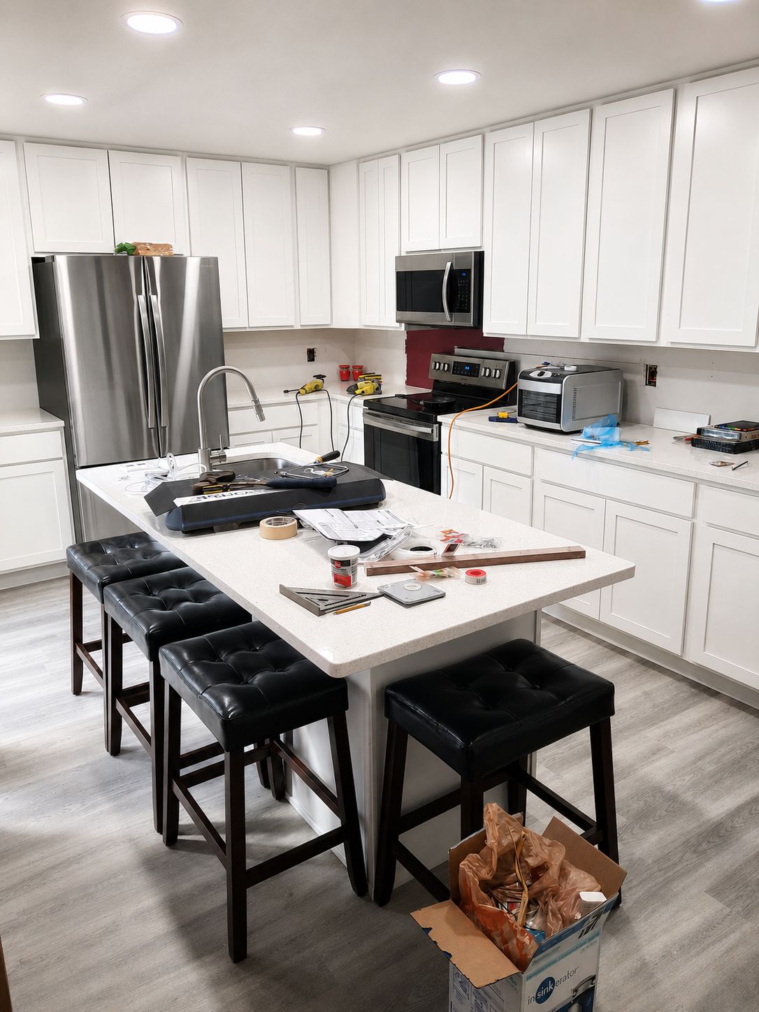 Cabinets installed, backsplash pending